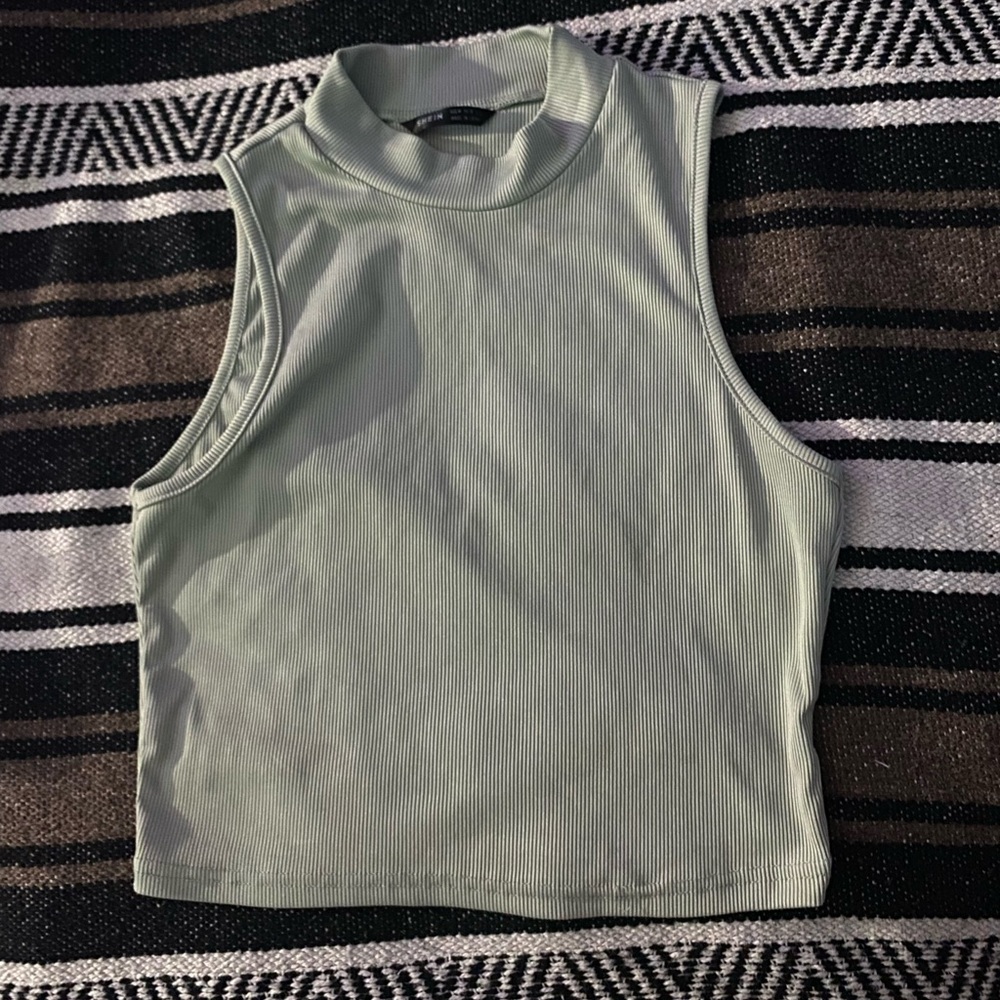 Light green top,Size S.